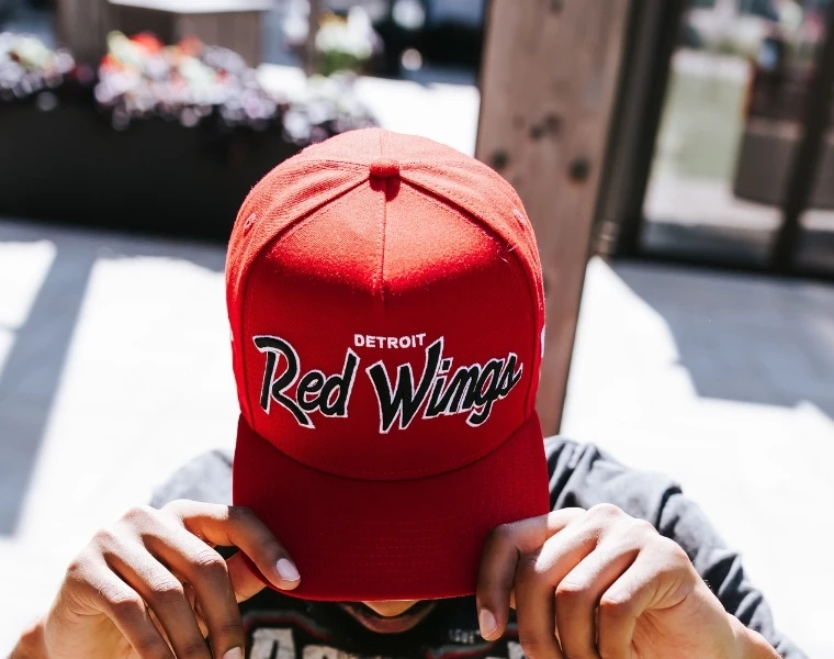 Red Detroit Red Wings Fanatics ball cap with the logo on the front.